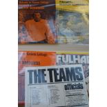 Album full of early football programs