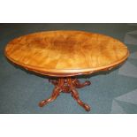 Victorian walnut tilt-top table on bulbous carved