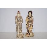 2 carved bone oriental figures