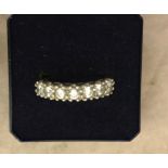 A 9ct CZ half eternity ring