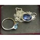 A 15ct topaz ring and topaz pendant on a silver chain by Dinny Hall