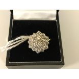 An 18ct diamond cluster ring