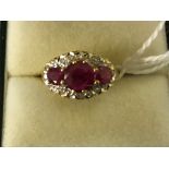 An 18ct large ruby and diamond dress ring