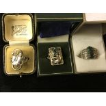 Three silver Art Nouveau/modernist rings: two set with stones