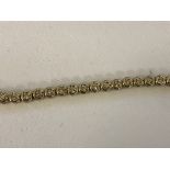 A 9ct diamond tennis bracelet: approx total 1ct