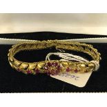 An 18ct floral design bracelet set with rubies