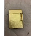 A gold-plated Dupont lighter