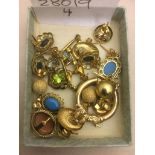 A quantity of 9ct gold earrings, creole, peridot,