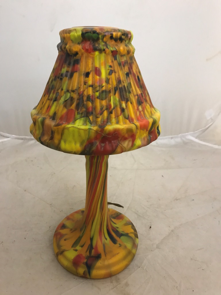 A multi-coloured glass lamp