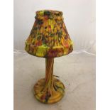 A multi-coloured glass lamp