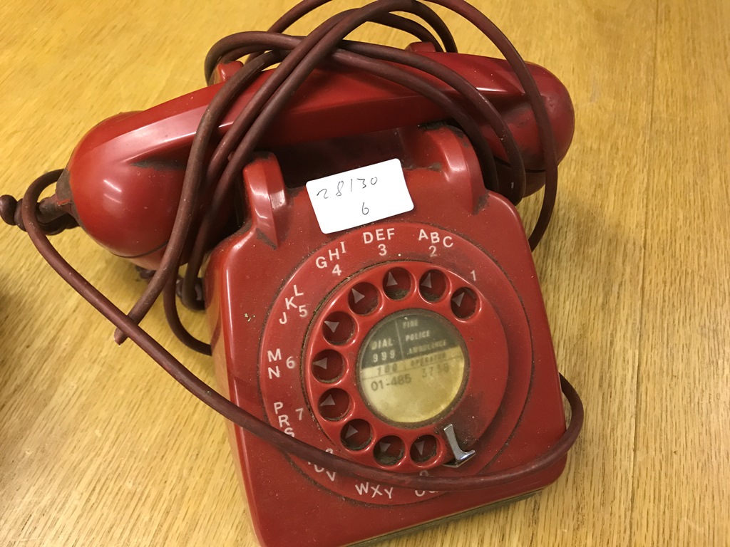 A vintage red GPO telephone