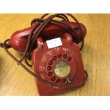 A vintage red GPO telephone