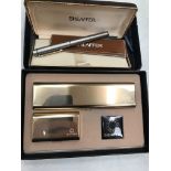 A boxed Schaeffer 'Imperial' brass pen set;