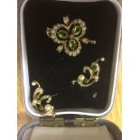 A 9ct pearl and peridot brooch and earrings