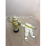 Two Michelin cast metal figures