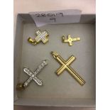 Four 9ct crucifixes