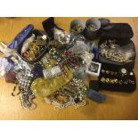 A quantity of costume jewellery to inc necklaces, earrings etc.