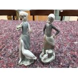 Two Lladro figurines of girls with geese