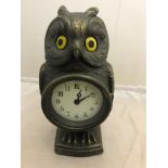 A clock in the form of a bronzed owl