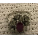 An 18ct ruby and diamond abstract dress ring (1.