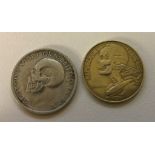 Two skull coins