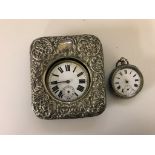 A HM silver travel clock case;