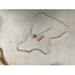 A 9ct clasped pearl necklace;