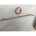 A 9ct peridot set bracelet (missing one stone);