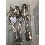 A pair of bright-cut Georgian silver spoons; together with .