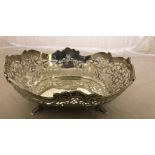 A silver pierced bowl on feet with heart cartouches by H Atkins