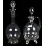 Two 19th Century Glass Decanters: The taller example with engraved monogram below a bishop's mitre,
