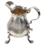 A George II Silver Cream Jug: London, 1737, maker's mark 'GP' beneath a rose,