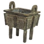 A small Chinese bronze square ding ritual vessel: Cast in a Shang-dynasty style with taotie