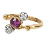 An Edwardian Style 9ct Diamond and Ruby Crossover Ring CONDITION REPORT: Weight: 3