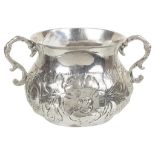 A Late 17th Century Porringer: Stamped with maker's mark only 'TM' or 'TN' above an eight pointed