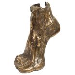 Of Advertising Interest: A bronze model of an arched right foot,
