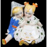 A Mid Twentieth Century Lenci Figure: Of two children, the base with black Lenci stamp,
