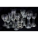 Thirteen 19th Century Faceted Stemmed Wine Glasses and Rummers: To include pairs,