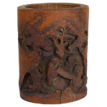 A Chinese bamboo brush pot: With carved low relief garden and figural scenes,