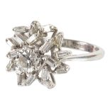 An Abstract Diamond Cluster Ring: With 18 baguettes surrounding a 1ct spread central stone