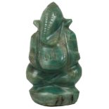 An Indian jade carving: In the shape of the elephant-headed deity Ganesha sitting with crossed legs.