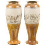 A Pair of Royal Doulton Hannah Barlow Vases: With incised central panels in cattle design,