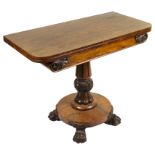 A William IV Mahogany Tea Table: With turned stem on four lion paw feet,