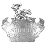 A George III Silver Escutcheon Wine Label: By Phipps and Robinson, London 1808,