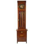 An Arts and Crafts Rosewood Longcase Clock: The Arabic numeral dial with gilt centre engraved with