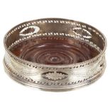 A George III Silver Wine Coaster: By Thomas Daniel, London 1785,