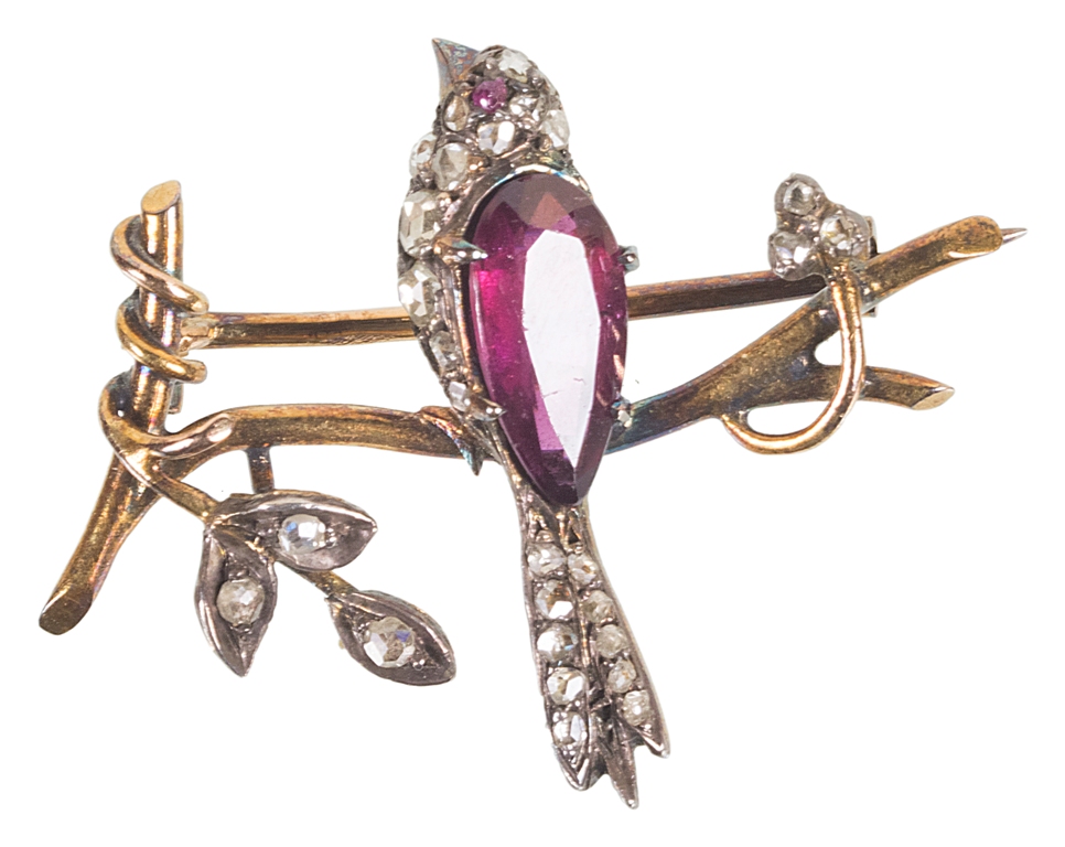 A 19th Century French Gold Brooch in the Form of a Bird: Beautifully stylized with garnet body,