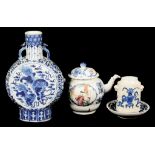 A collection of Chinese blue and white wares: To include a moon flask decorated with lion dogs and