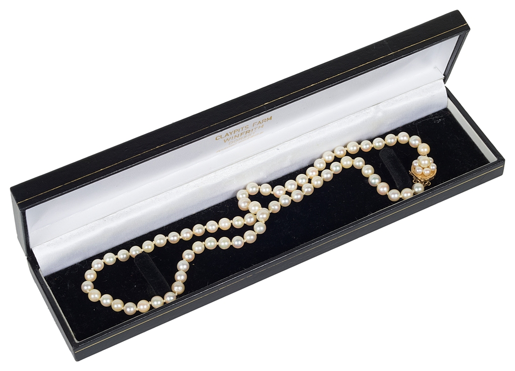 A Chinese 14k Clasped Single Strand of Pearls,