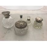 A quantity of HM silver perfume bottles